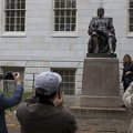 315-0599 Posing with Statue of John Harvard.jpg